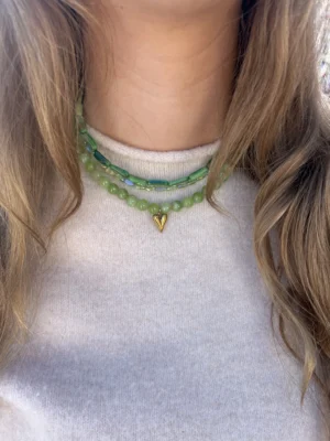 Groene kralenketting met klein hartje